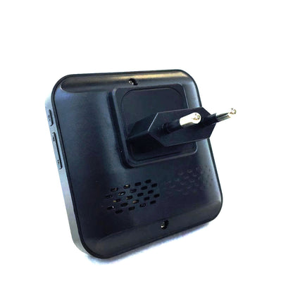 Black electronic device with a plug on a white background