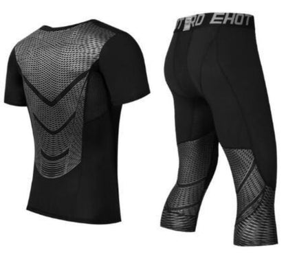 A black long sleeve men's compression shirt with blue geometric patterns on the back.