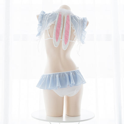 Mannequin wearing a pastel-colored bunny costume with transparent wings on a white background