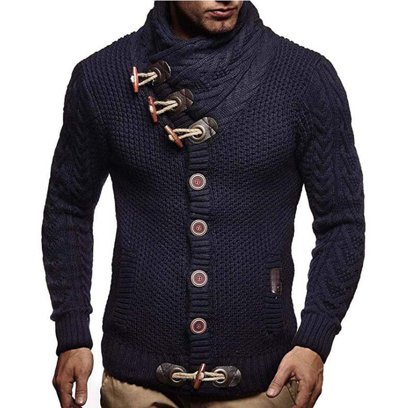 Navy blue knitted sweater with decorative buttons on a white background