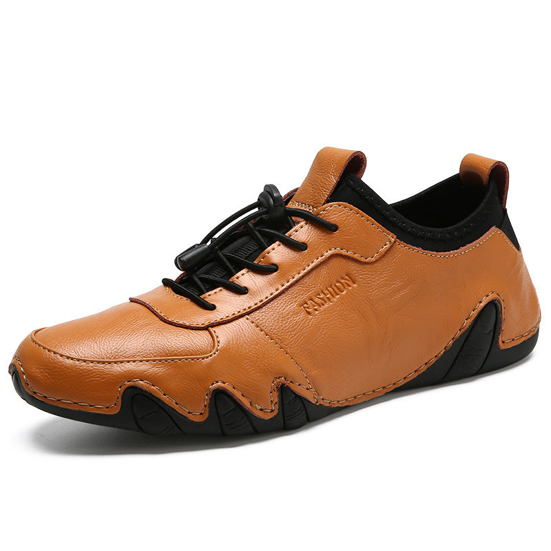 Brown leather shoe with black accents on a white background