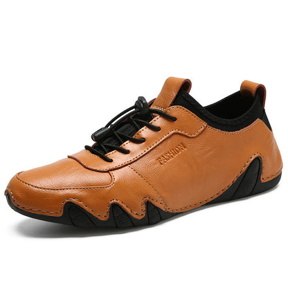 Brown leather shoe with black accents on a white background