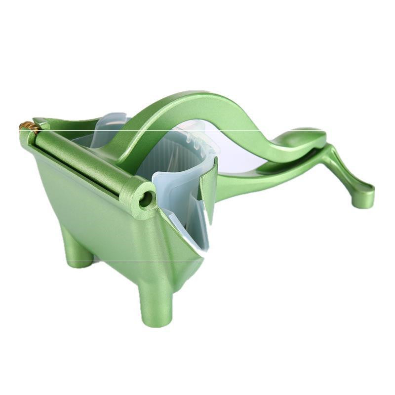 Green kitchen tool on a white background