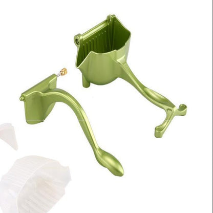 Green manual juicer with parts on a white background