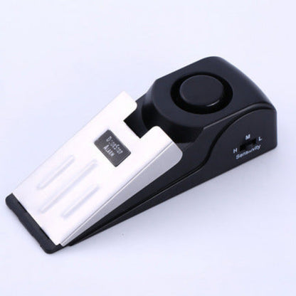 Black and white electronic device on a light gray background