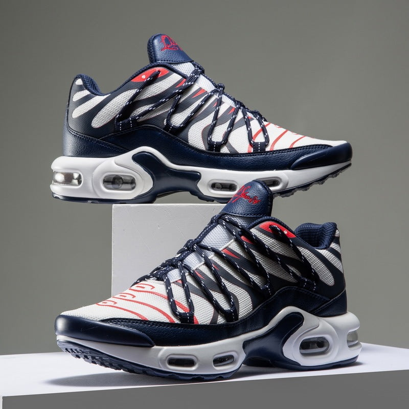 Pair of sneakers with a gray background