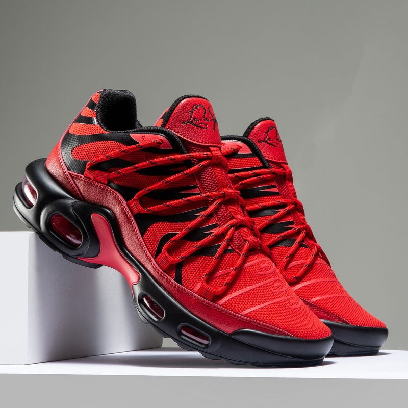 Red and black sneakers on a gray background
