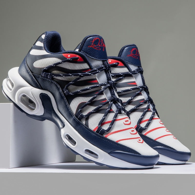Pair of sneakers with a gray and blue design on a gray background