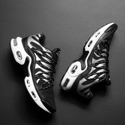 Black and white sneakers on a dark gray background