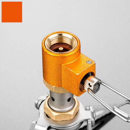 Close-up of a brass valve on a gray background