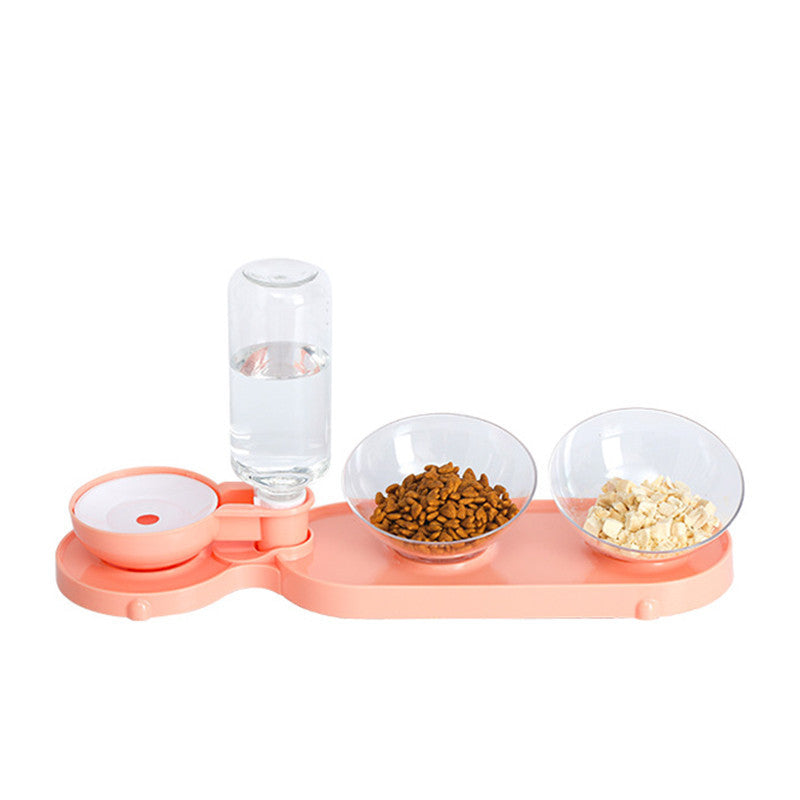 Pet feeding station with water bottle, food bowls, and treats on a white background