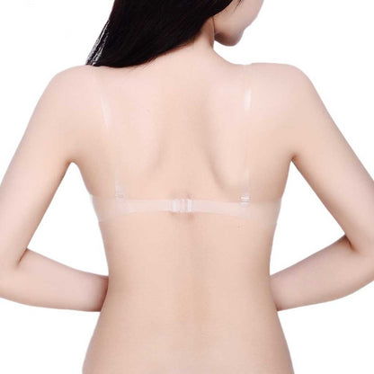 Transparent adhesive patch applied to a person's back.
