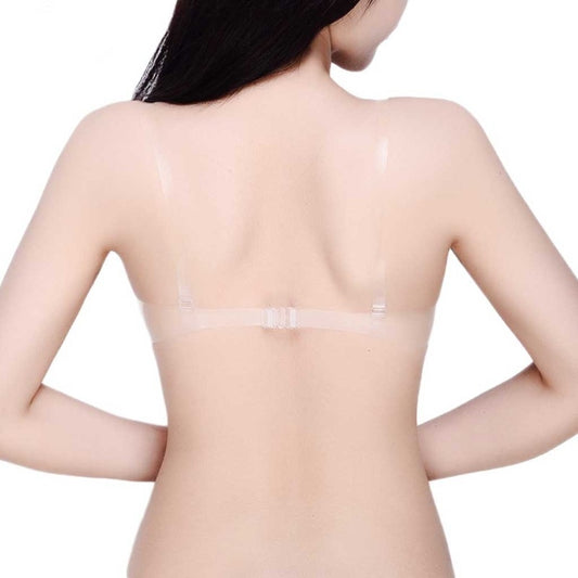 Transparent adhesive patch applied to a person's back.