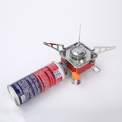 Portable camping stove with a canister on a white background