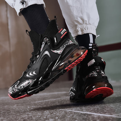 Black and red sneakers worn indoors on a neutral background