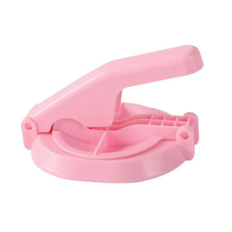 Pink plastic tool on a white background
