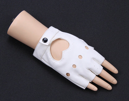 A pair of white half-finger gloves with heart cut-outs, displayed on a mannequin hand against a black background.