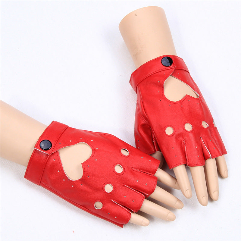 A pair of white half-finger gloves with heart cut-outs, displayed on a mannequin hand against a black background.