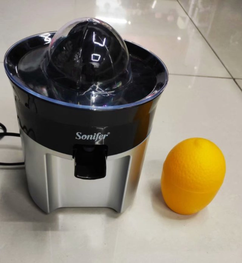 Sonifer citrus juicer with an orange on a white surface
