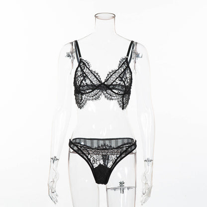 Black lace lingerie set on a mannequin against a white background