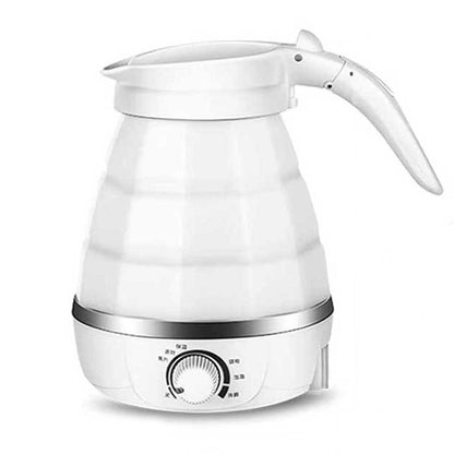 White electric kettle with a temperature control dial on a white background