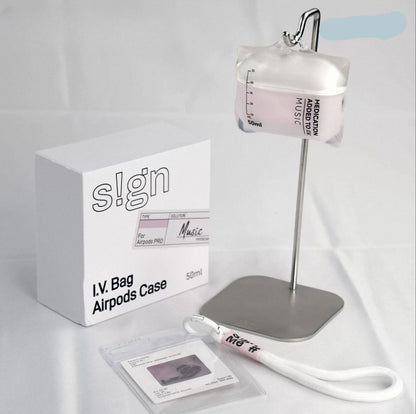IV bag airpod case with packaging and accessories on a white background