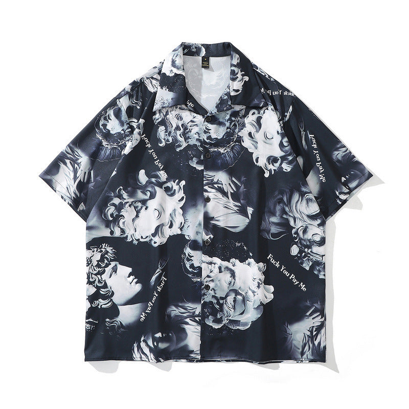 A short-sleeved chemical fiber shirt featuring a black and white floral pattern with a lapel collar.