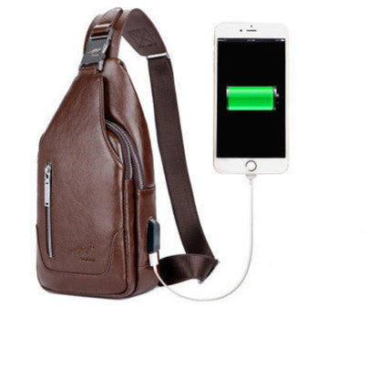 Brown sling bag with USB cable connected to a smartphone on a white background