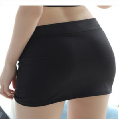 Black skirt worn by a person on a white background