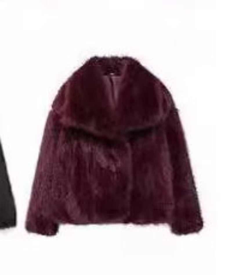 Maroon fur coat on a white background