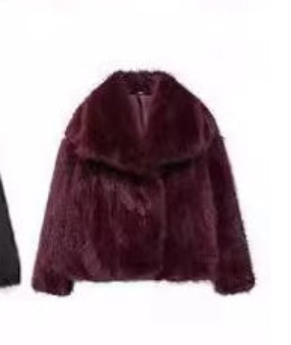 Maroon fur coat on a white background