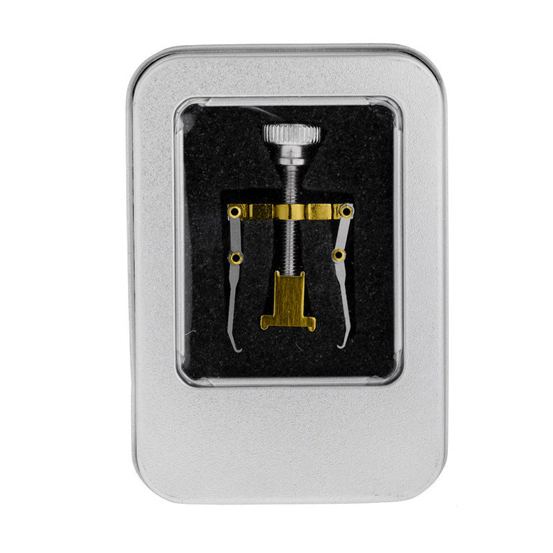 Set of tools in a silver box on a white background