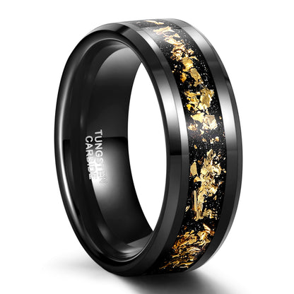 Black tungsten ring with gold inlay on a white background
