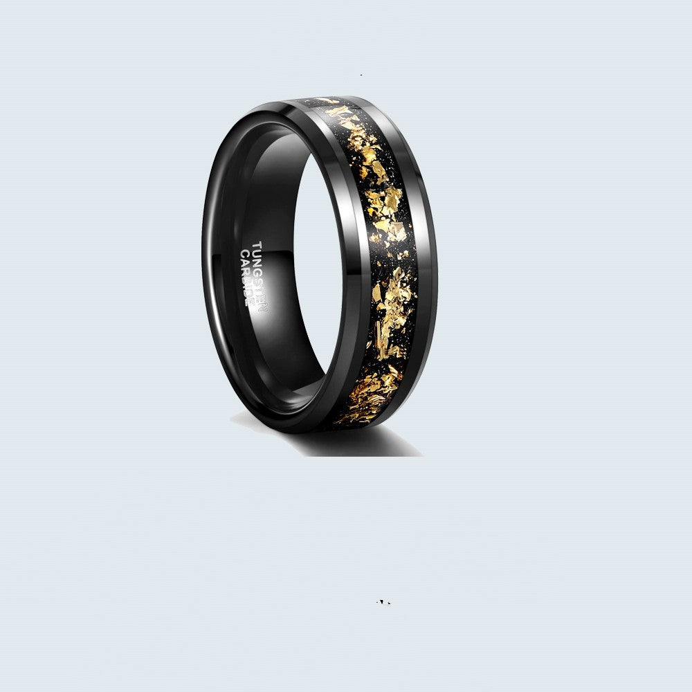 Black tungsten ring with gold inlay on a light gray background