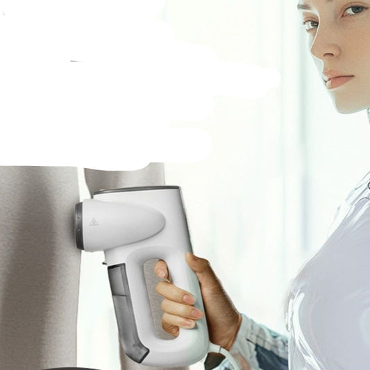 Person using a handheld vacuum iron on fabric with text about features.
