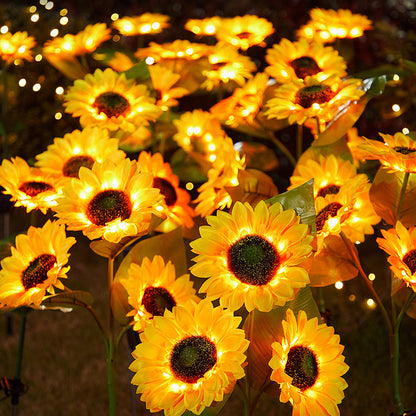 Decorative sunflowers with embedded lights on a dark background