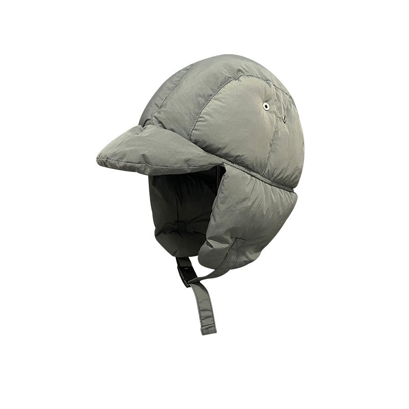 Gray winter helmet with ear flaps on a white background