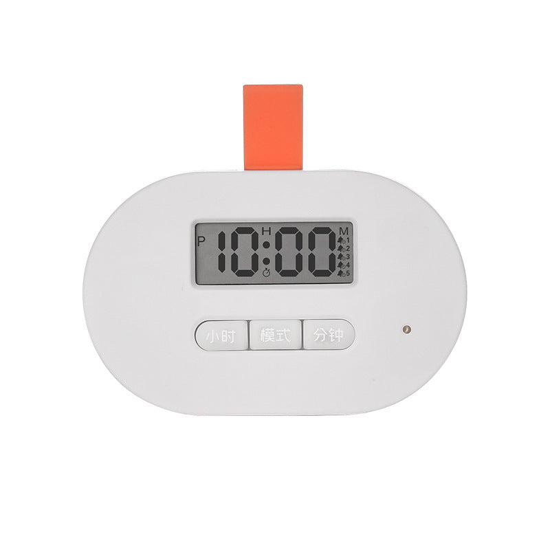 Digital clock with a white body and orange top on a white background