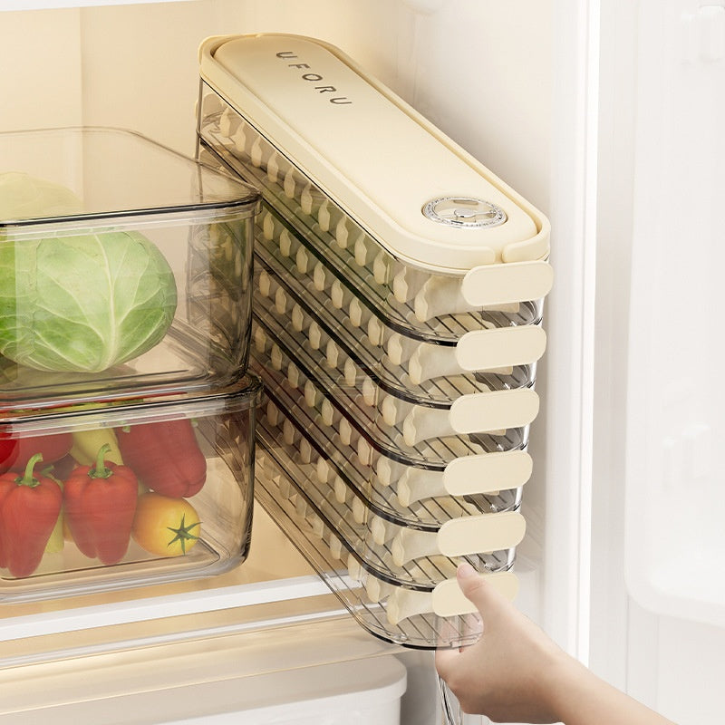 Stackable food storage containers with a hand reaching for one, placed inside a refrigerator.
