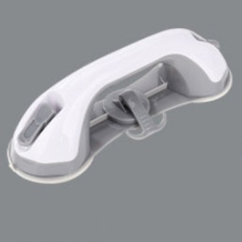 Gray and white suction cup tool on a gray background