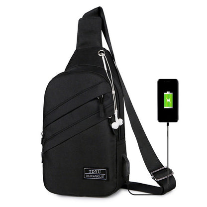 Black sling bag with USB port and smartphone on a white background