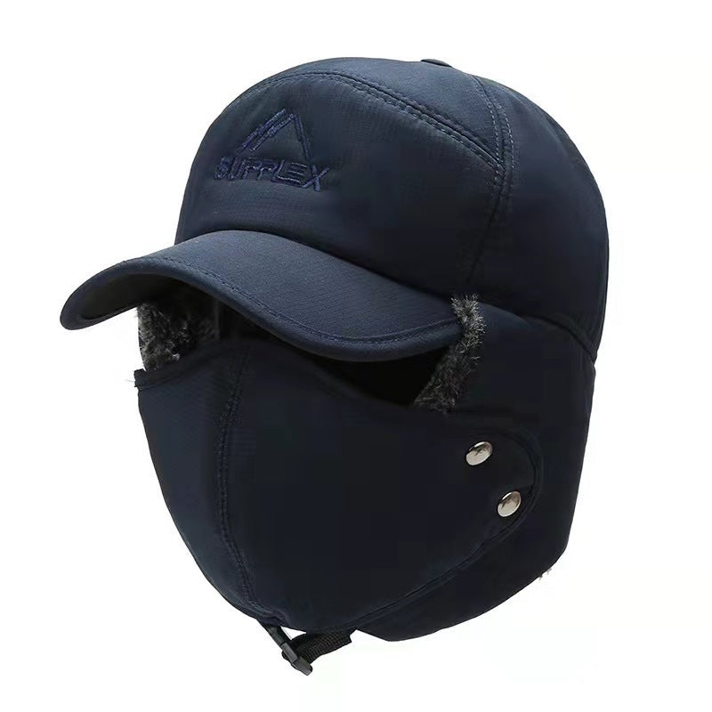 Navy winter cap with face mask and ear flaps on a white background
