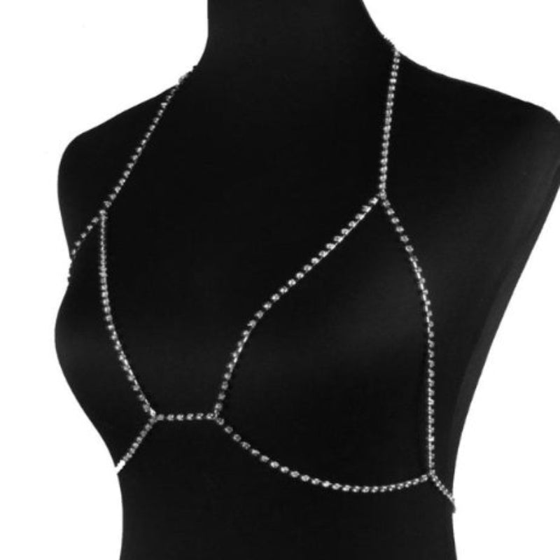 Silver chainmaille top on a black mannequin.