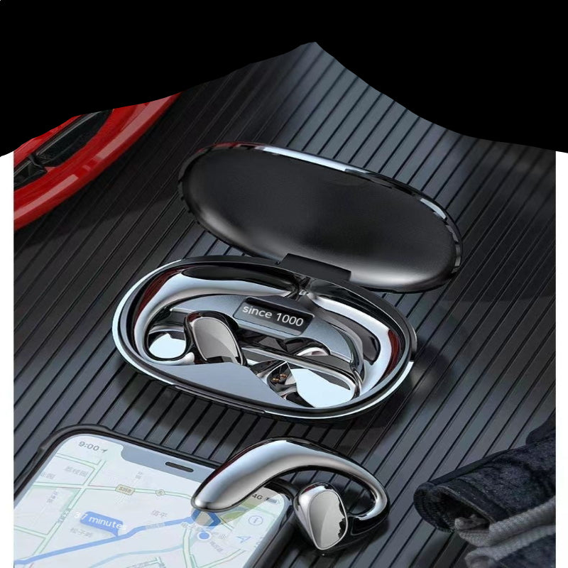 Wireless earbuds in a black case on a textured surface with a smartphone displaying a map.