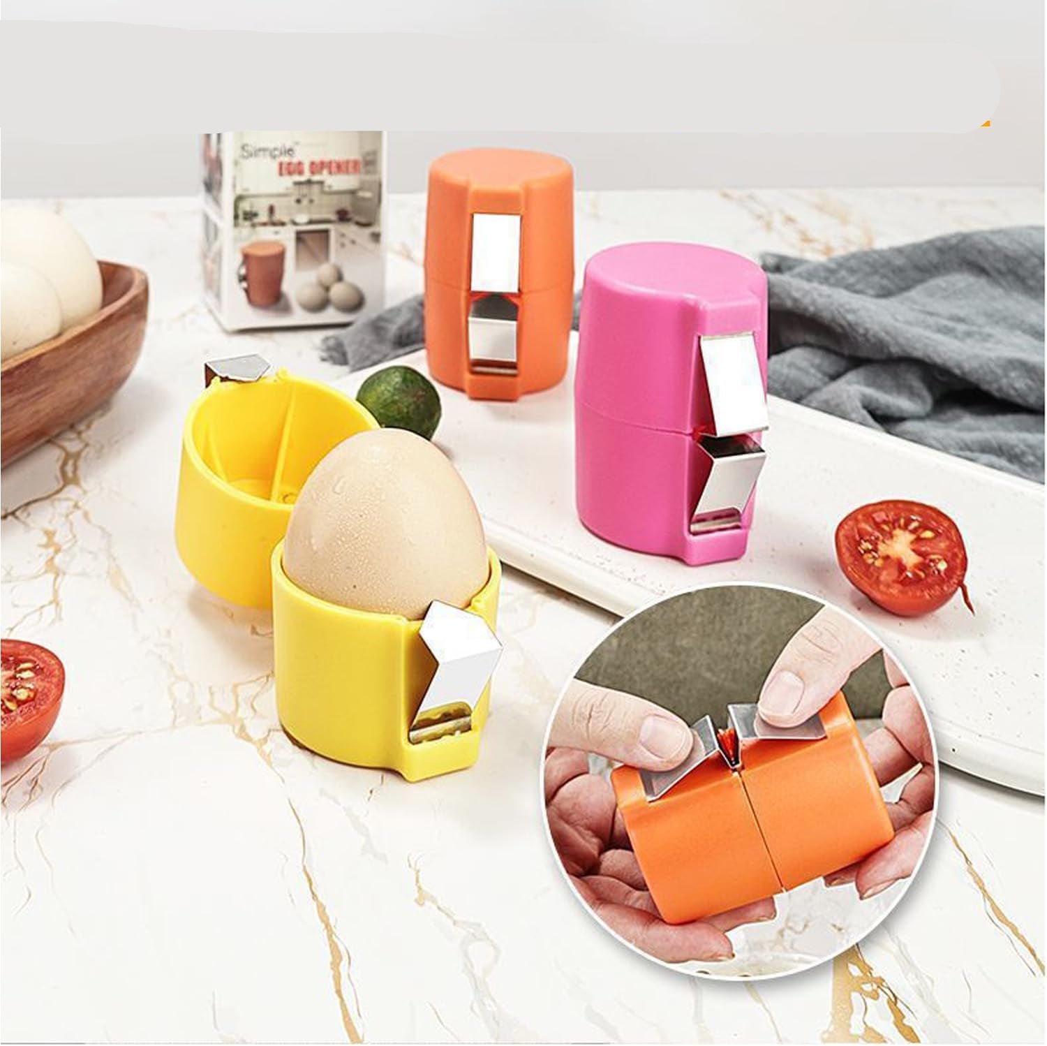Colorful stainless steel press plates on a kitchen counter with tomatoes and a book in the background.