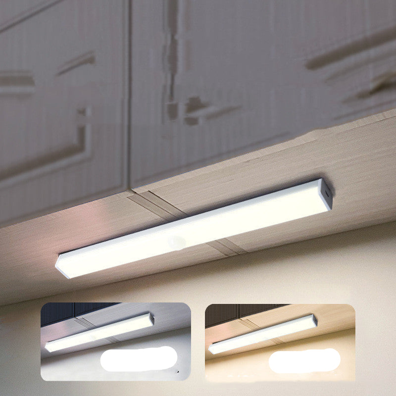 Under-cabinet LED light bar with color temperature options on a kitchen cabinet background.