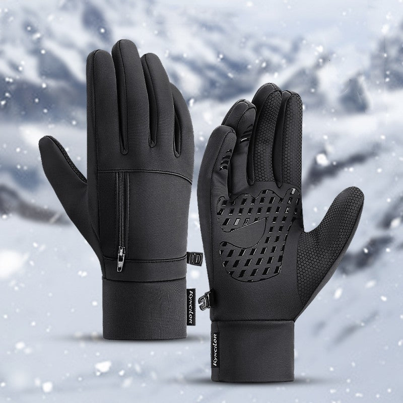 Black gloves with touch screen tips on a snowy background