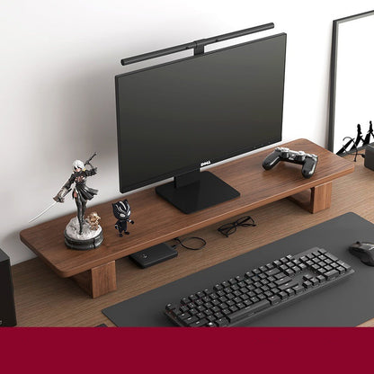 Monitor stand made of black walnut wood, with a computer monitor, keyboard, and various desk accessories on it, placed on a wooden floor against a white background.