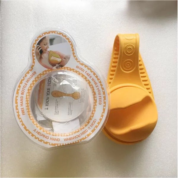 Yellow hand bottle holder with packaging on a white background