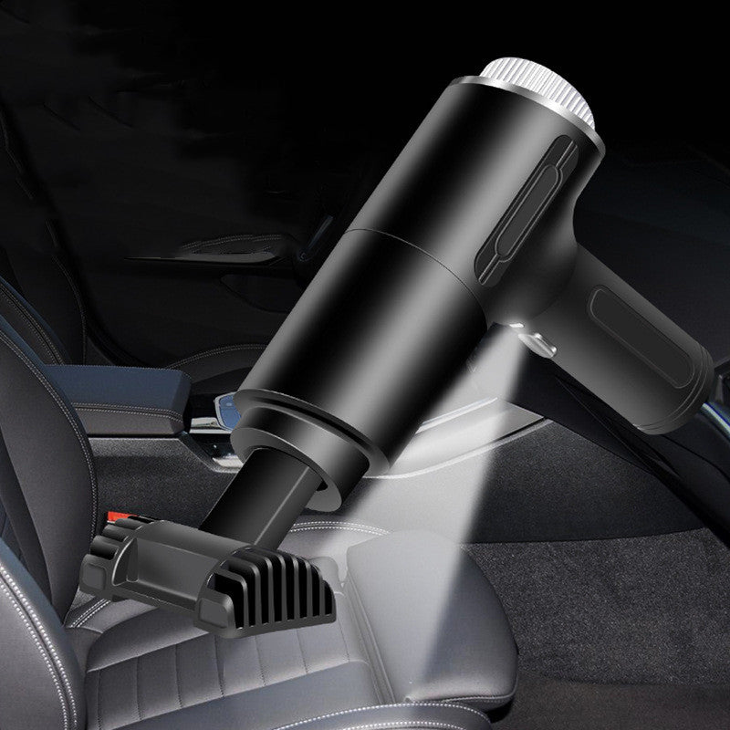 Black handheld vacuum cleaner on a gray background